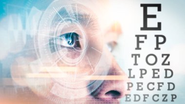 the man looking to the dynamic visual acuity test chart. the concept of visual, optical, eyeglasses and medical 