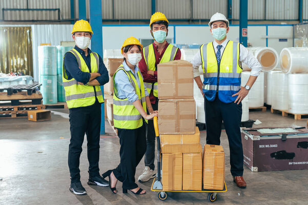 Workers Wearing Protective Face Mask Working Warehouse Covid Pandemic Concept Stock Image