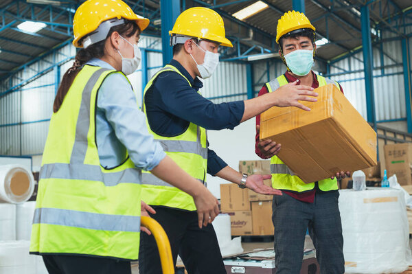 Workers Wearing Protective Face Mask Working Warehouse Covid Pandemic Concept Royalty Free Stock Images