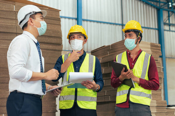 Workers Wearing Protective Face Mask Working Warehouse Covid Pandemic Concept Royalty Free Stock Photos