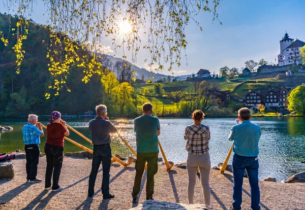 Werdenberg Switzerland April 2021 Group Alpine Horn Players Performing Lake — Stock Photo, Image