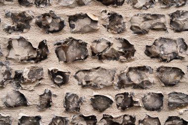 Soyut bir arka plan dokusu için Fransa 'nın Honfleur kentindeki eski bir tuğla duvarı kapatın..