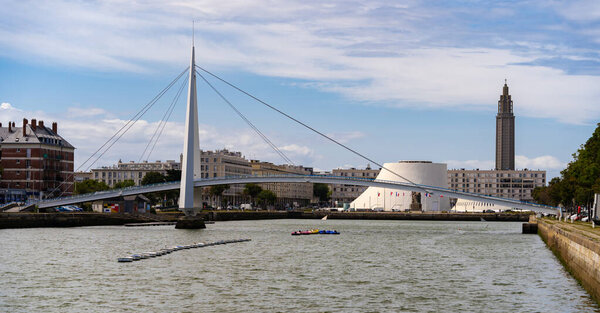 Le Havre, France - August 8, 2021: The town center of Le Havre, Normandy, France with the Footbridge across Commerce Basin and a little vulcano cultural center