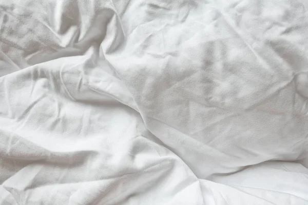 White Natural Cotton Sheet Pościel Materiał Close Nierozwinięte Łóżko Hotelowe Zdjęcia Stockowe bez tantiem