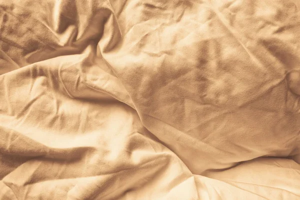 Buruşuk Süet Pamuk Doku Arkaplanı. Bej mikrofiber materyal arka plan Makro yakın plan. Sarı Kumaş Çarşaf.