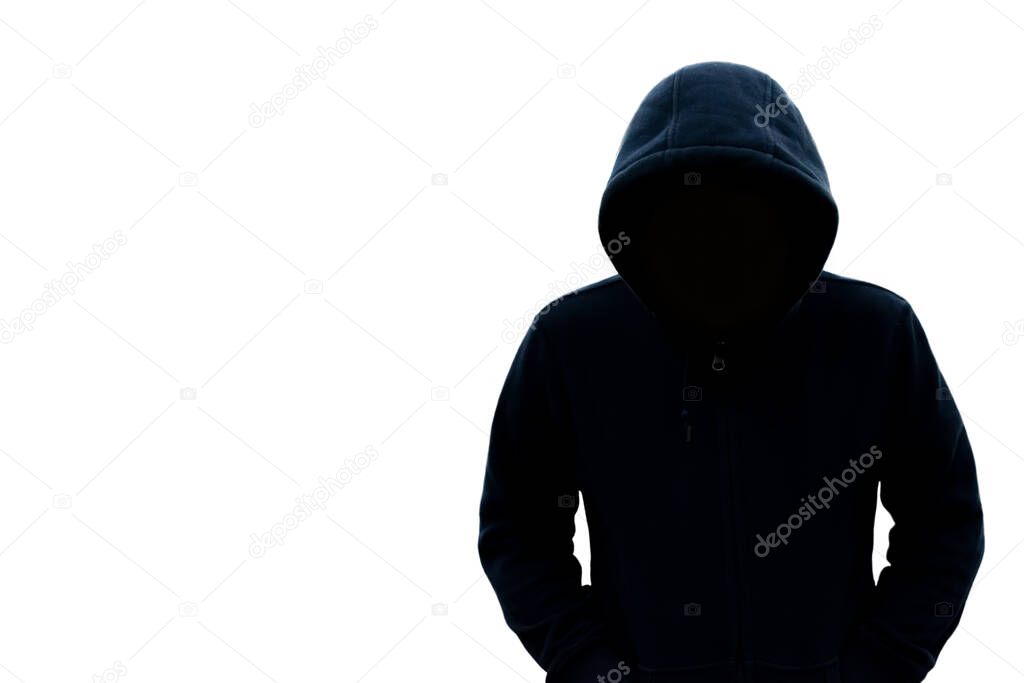 A man with a hood does not see his face. Danger in the dark On a white background With an empty space on the left for text or design