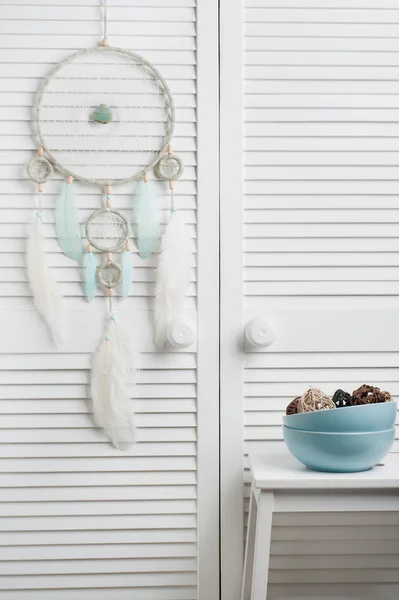 Dream catcher with mint feathers