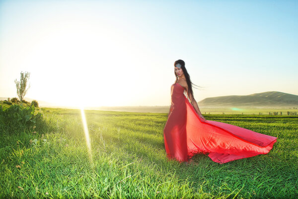 Photo outdoor of woman in red dress
