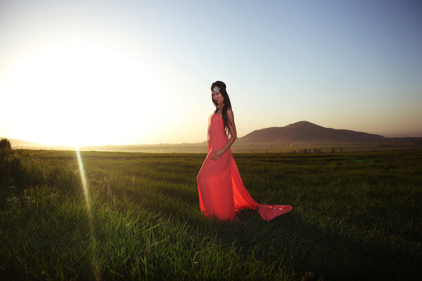 Photo outdoor of woman in red dress