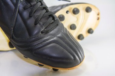Seçici odak düğmesine futbol Ayakkabı