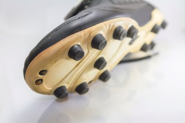 Seçici odak düğmesine futbol Ayakkabı