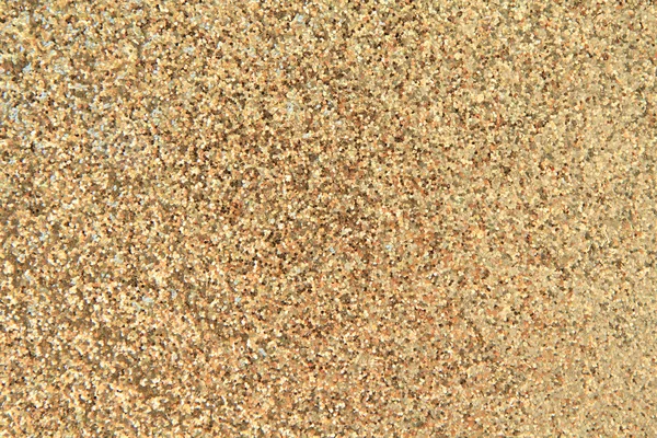 Gold plastic pellets — Stock Photo, Image