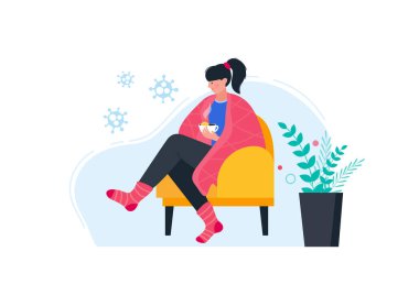 Sıcak elbiseli hasta kadın limonlu sıcak çay içiyor..