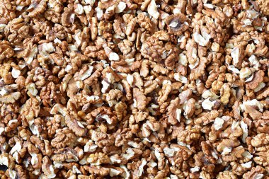 Bir sürü ceviz çekirdeği, üst görünüm, arka plan.