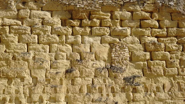大きな黄色の石の壁の背景 — ストック写真