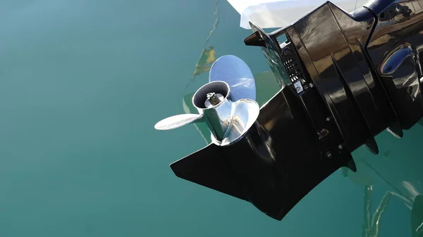 motor propellers boat against water