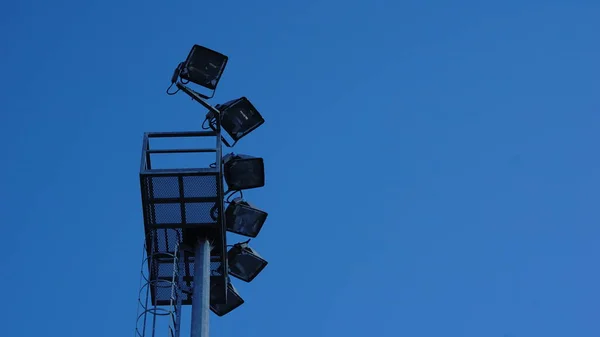 Deporte Luces Del Estadio Contra Fondo Azul —  Fotos de Stock