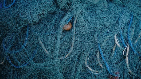 堆叠的乡村渔网背景 — 图库照片