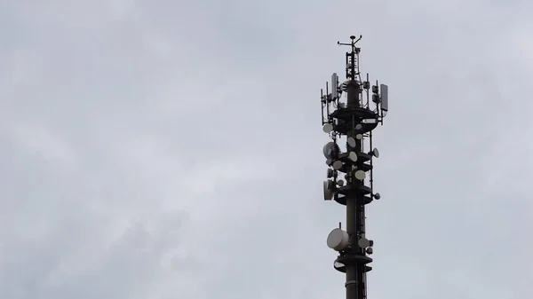 telephone antenna, communication tower against sky