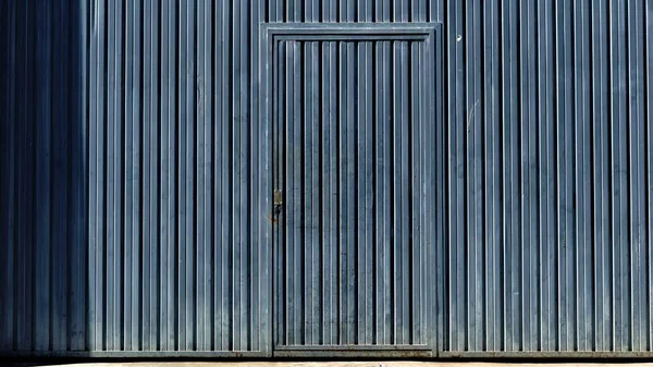 metal door from industrial factory as background