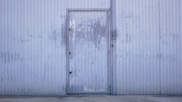 worn metal industrial door as background