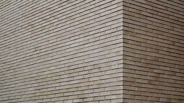 Beige Brick Wall Angle Background — Stock Photo, Image