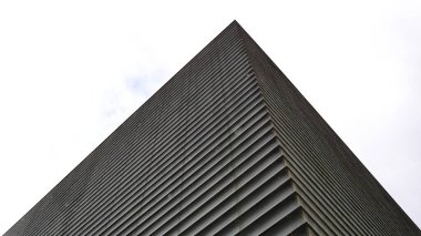 Sharp corner of modern clad building