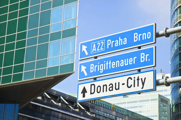 Donau City roadsign kék háttér — Stock Fotó