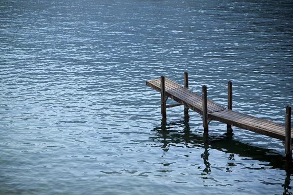 Wooden pier by the lake — Stock Photo, Image