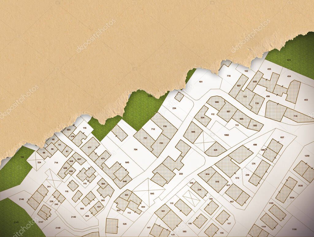 Imaginary cadastral map of territory with buildings, roads and land parcel with copy space for text insertion over a cardboard background.