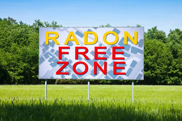 RADON GAS FREE ZONE: concept image with a vacant land free from the natural and dangerous radioactive gas that comes from the earth and advertising billboard in a rural scene with city map.