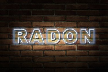 Tuğla duvara yazılmış Radon gaz metni - bilgi konsepti resmi.