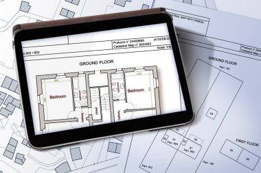 Dijital tablet üzerinde binaların, arazi paketlerinin ve kadastro iç planının bulunduğu hayali kadastro haritası - Not: harita arka planı tamamen icat edilmiş ve gerçek bir yeri temsil etmiyor.