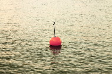 Bouy by the lake clipart