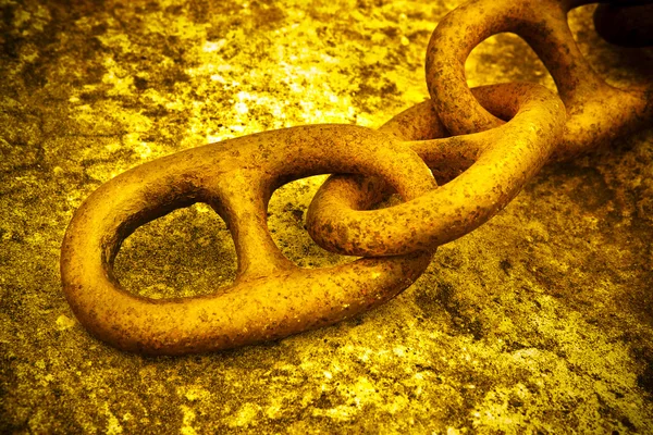 Detail of an old rusty metal chain anchored to a concrete block — Stock Photo, Image