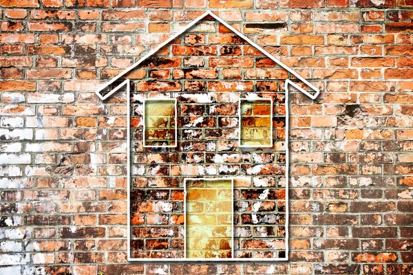 벽돌 벽 바탕에 색된 집의 실루엣 — 스톡 사진