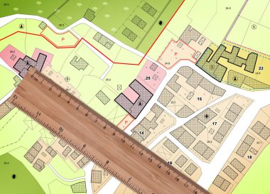 Land plot management - real estate concept with a vacant land available for building construction in a residential area against an imaginary cadastral map