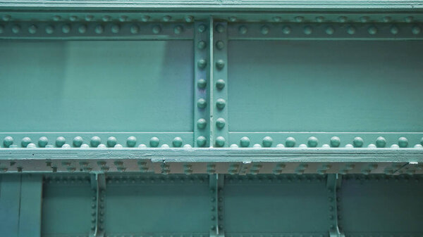 19TH-CENTURY METALLIC RIVETS ON AN INDUSTRIAL STEEL STRUCTURE ideal for engineering, structural calculation, architecture, and industrial design themes