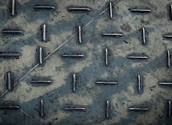 Texture of metal Diamond plate steel floor of ferry with diamond pattern. Old metal floor background.