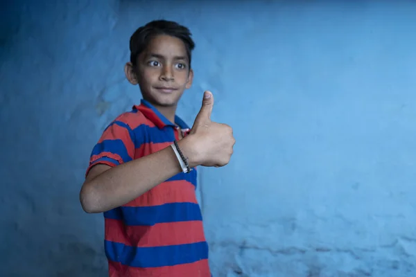 Young Indian Kid Showing Thumbs Camera Standing Blue Background — Stock Photo, Image