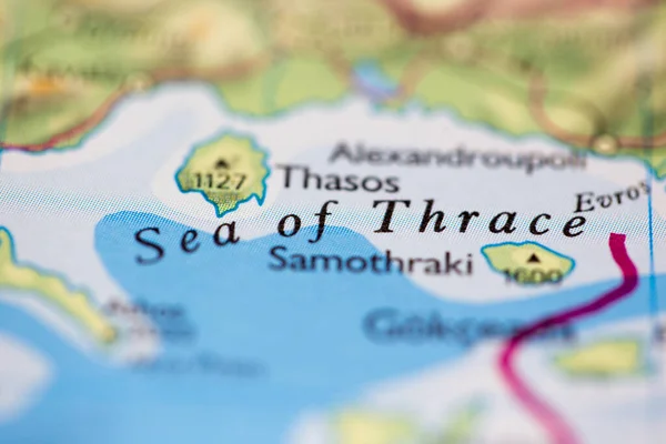 Shallow depth of field focus on geographical map location of Sea of Thrace off coast of Greece on atlas
