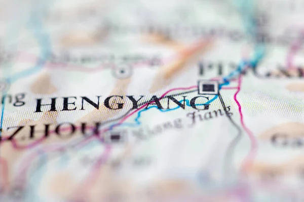 Shallow depth of field focus on geographical map location of Hengyang China Asia continent on atlas