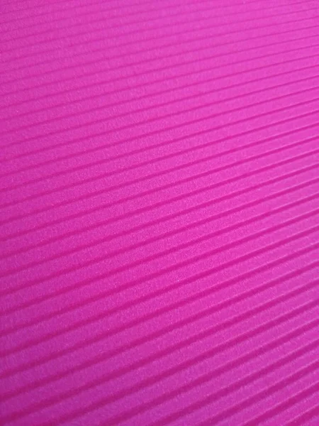 Sfondo rosa con strisce parallele ad angoli diversi — Foto Stock
