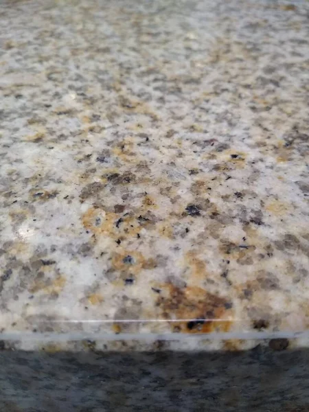 A superfície de mármore é cinza bege na cor como um fundo — Fotografia de Stock