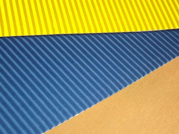 Žluté a modré žebrované vlnité pozadí s diagonální STRIPE — Stock fotografie