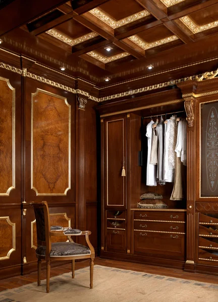 Corner of a wardrobe with walls and ceiling in wooden boucherie