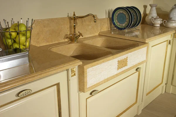 Kitchen cabinet with stone sink