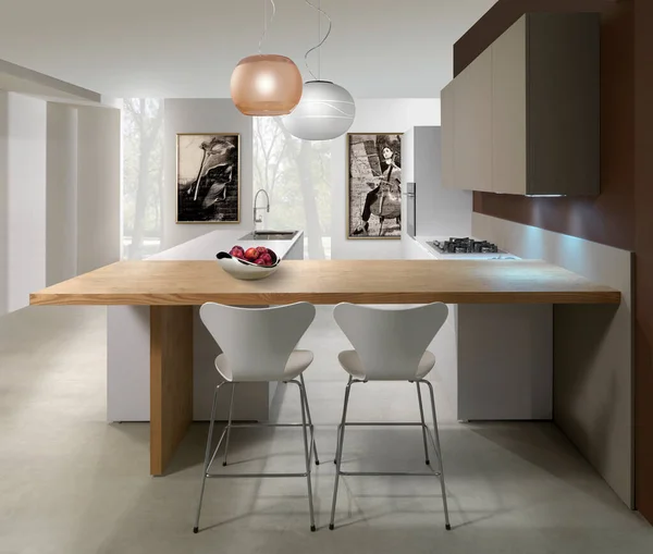 Kitchen area with wooden top and chairs