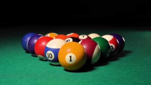 Breaking down pyramid of the balls with a hit — Stock Video