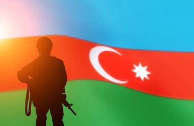 Silhouette Of A Solider Saluting Against the flag of Azerbaijan . Concept of national muslim holidays. Independence Day, Victory Day. clipart